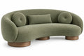 Sofá curvo tapizado de contorno redondeado, verde y marrón